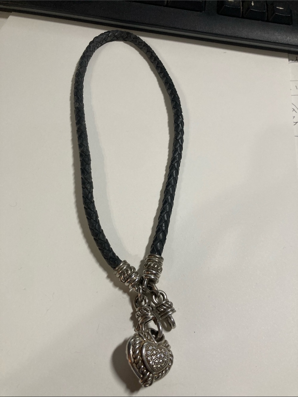 Judith Ripka braided leather sterling with CZ heart pendant. 18”